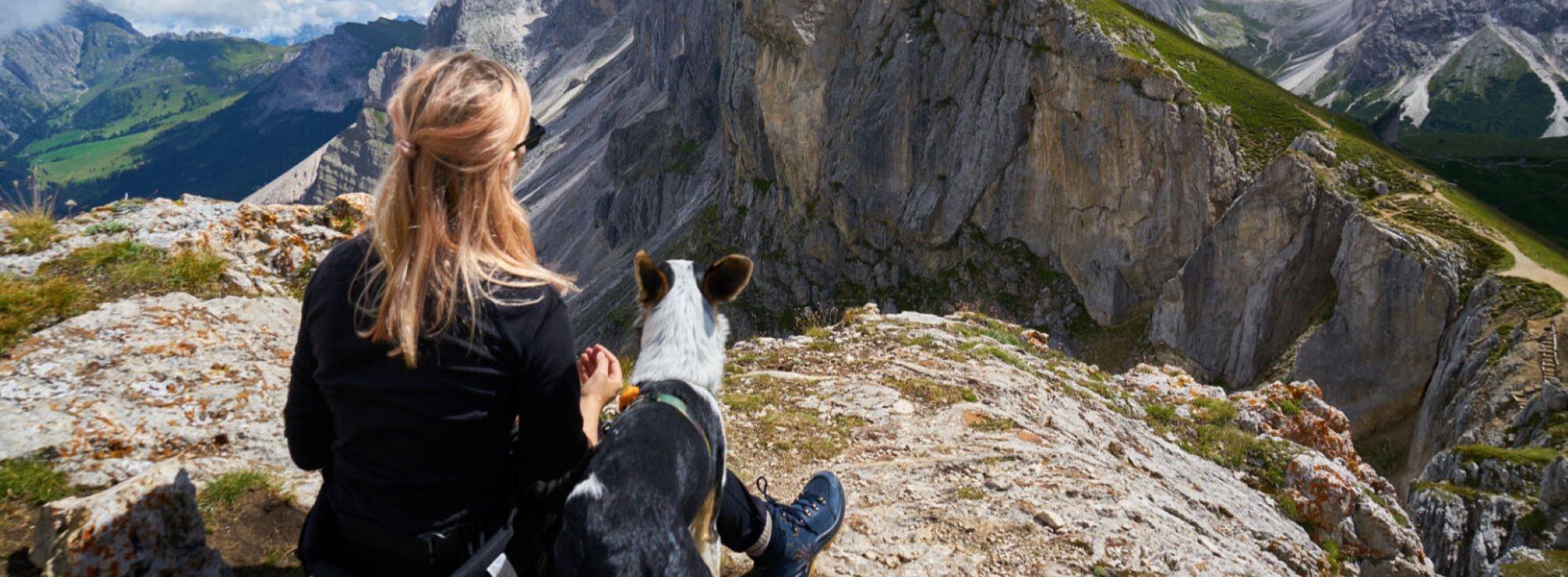 Dog and owner on mountian